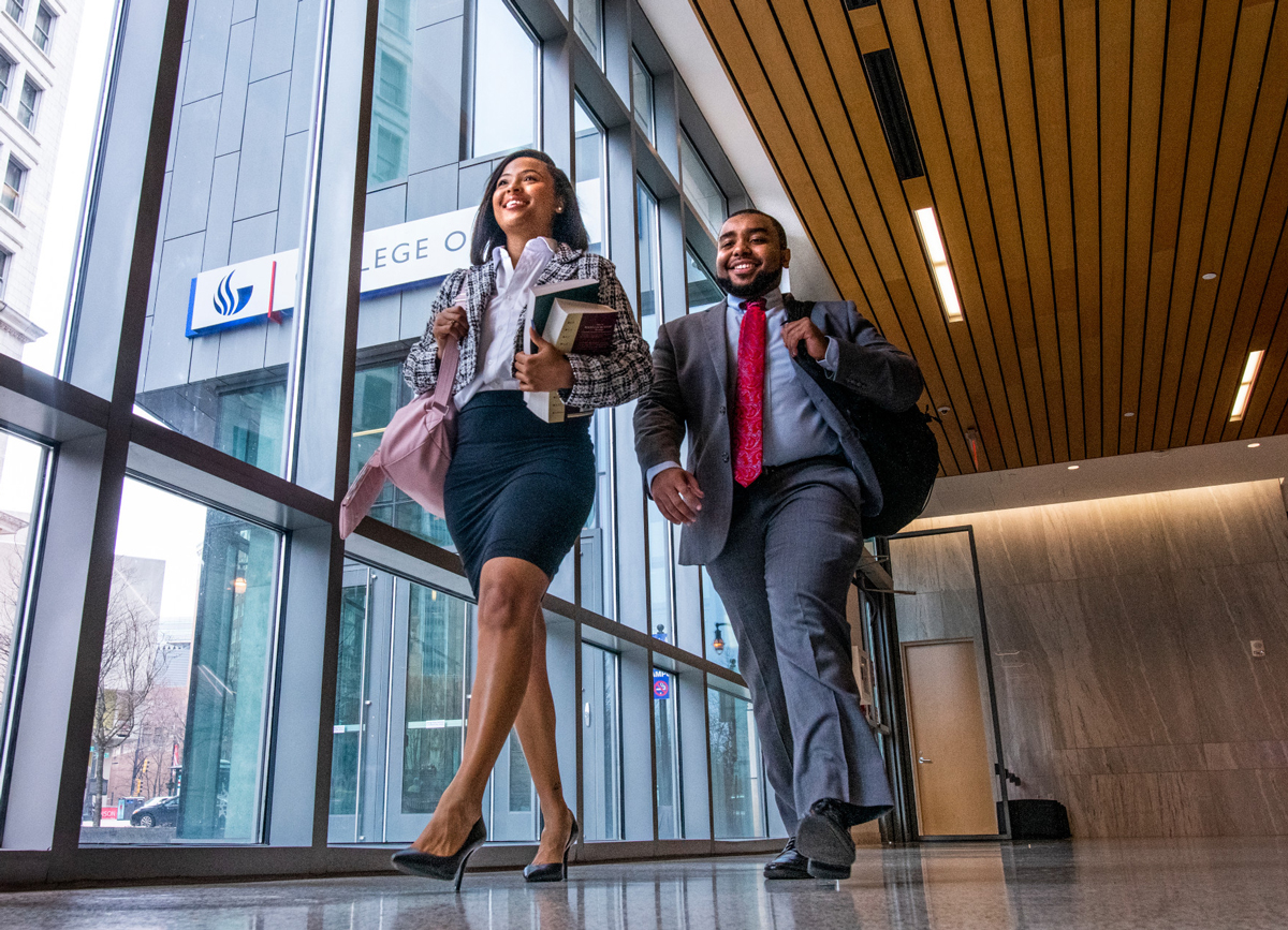 Law students walking in the hallway.